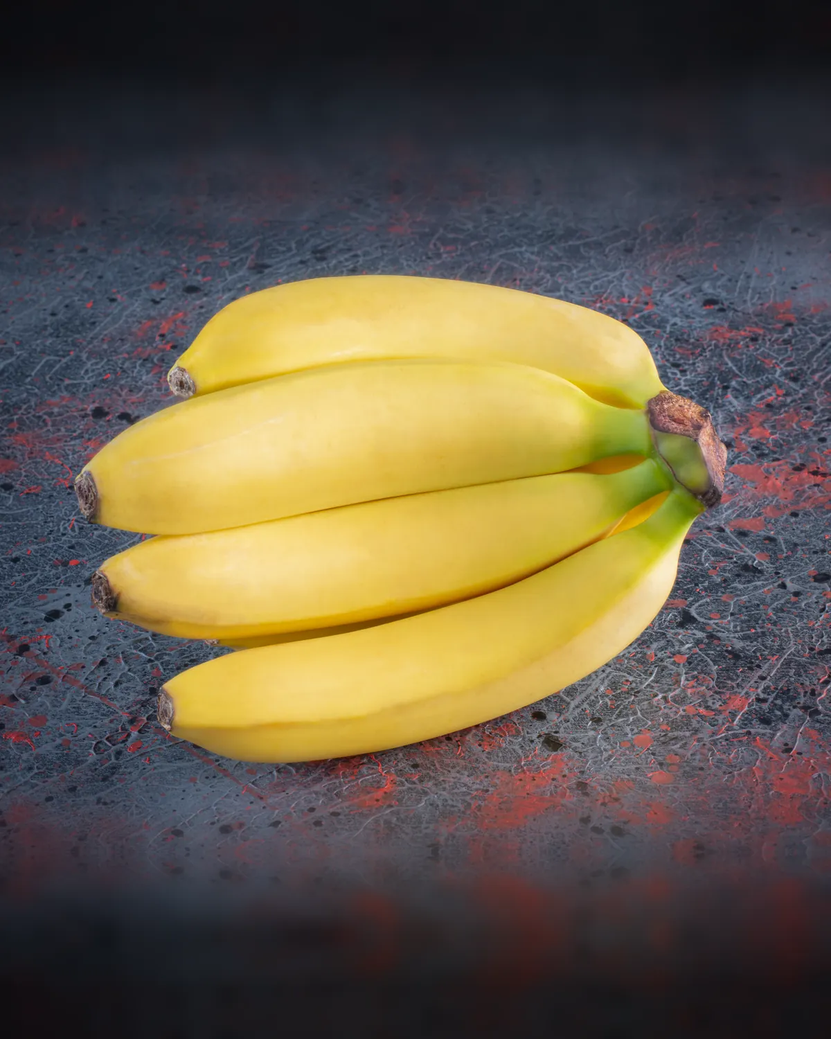 A freshly harvested bunch of bananas with green crowns
